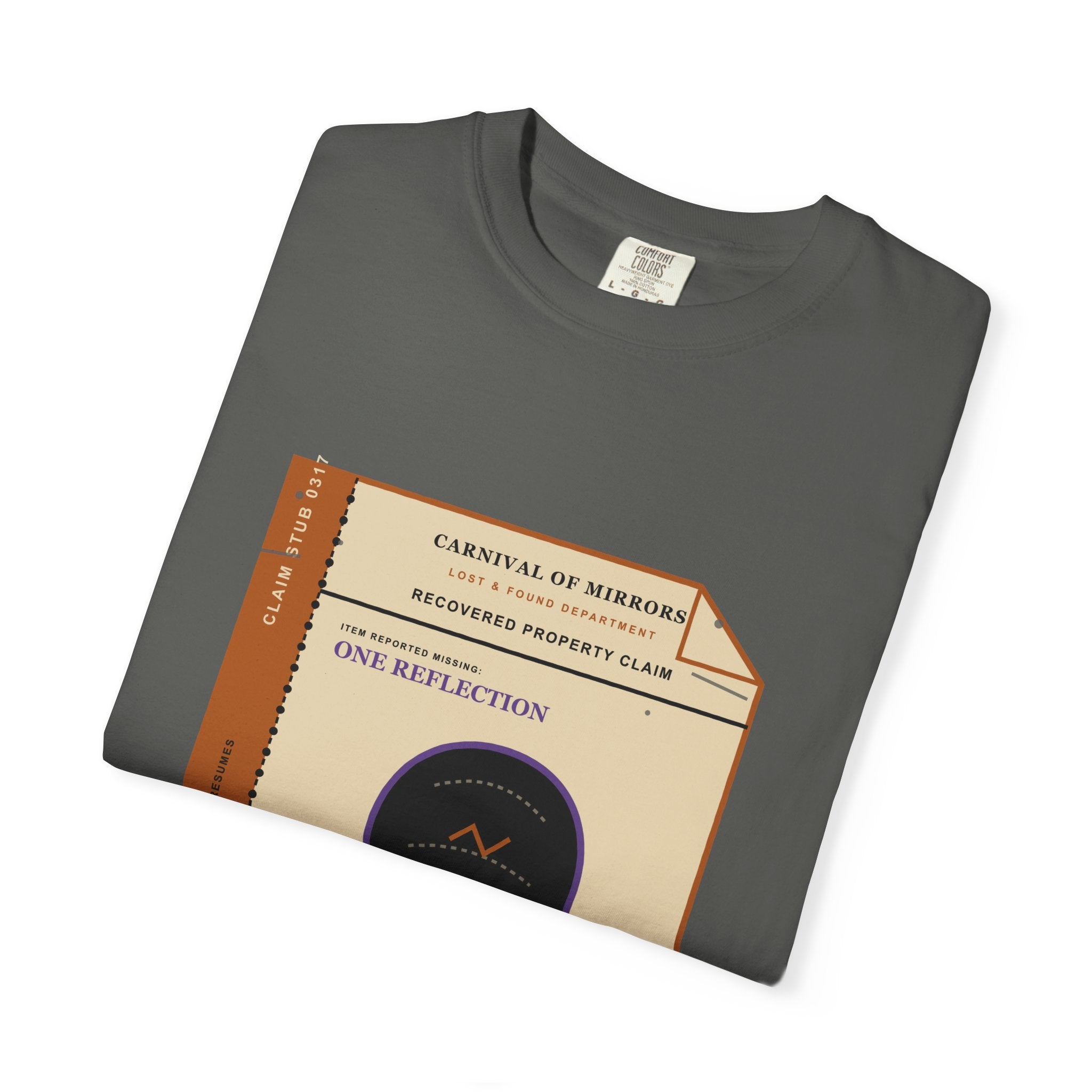 Folded Lost & Found claim ticket tee showing the recovered-property artwork