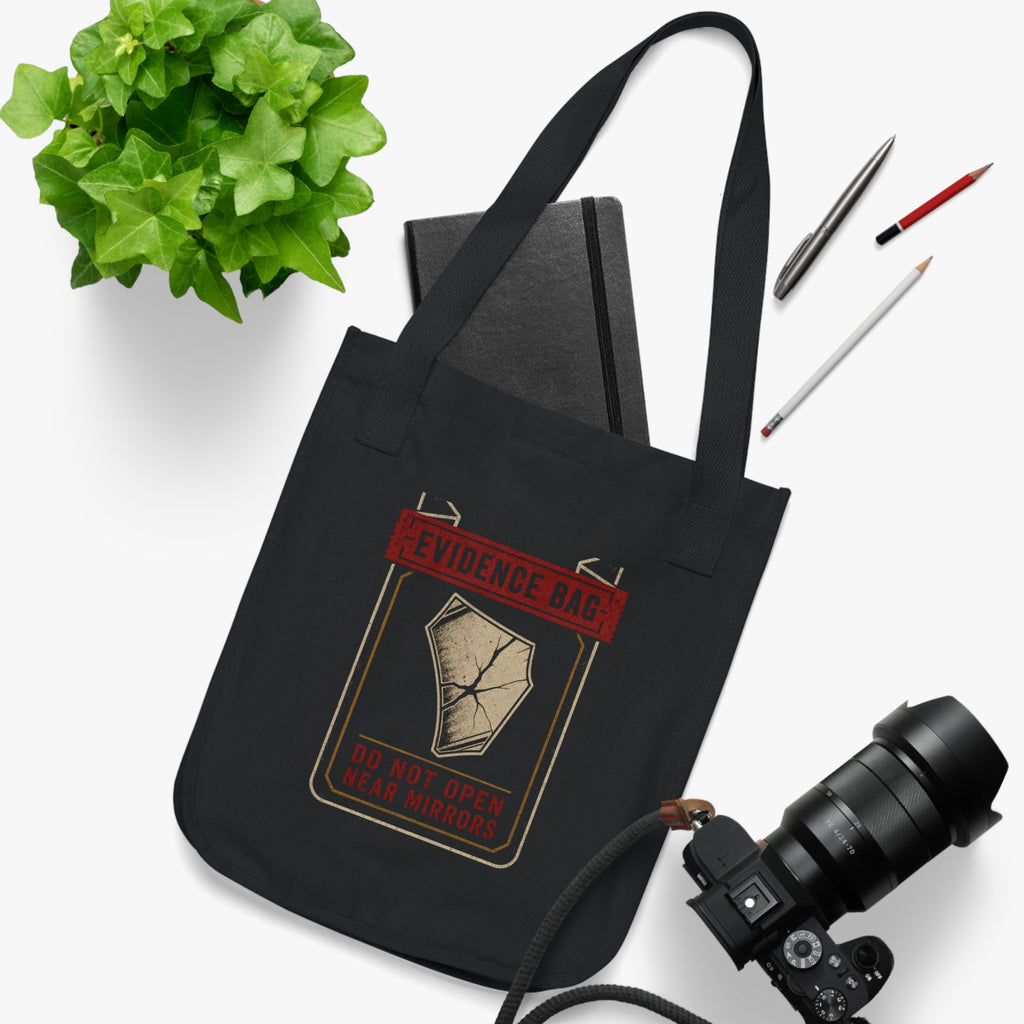 Close-up of the Evidence Division tote artwork